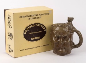 ROBERT MENZIES Bendigo Pottery character jug in original box, limited edition, designed by Melbourne Herald cartoonist John Frith in 1973, oval factory stamp with title to base, 17.5cm high