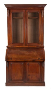 An antique Australian cedar and red pine cylinder roll top secretaire bookcase, 19th century, 230cm high, 119cm wide, 62cm deep