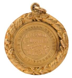"The Exhibition Trustees" 18ct gold fob depicting the Melbourne Exhibition Buildings, and verso, engraved for "Alderman S.J. Morell, J.P. Appointed Trustee 9th Nov. 1926"; 17.8gms.