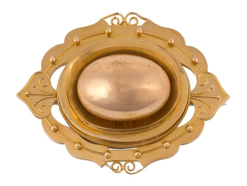 An antique Colonial mourning brooch with window back, tests as 18ct gold or better, most likely Melbourne origin, 19th century, 5cm wide, 13 grams total