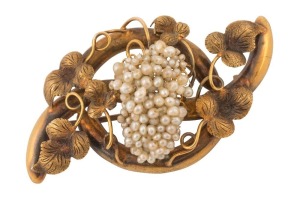 An antique Colonial gold brooch set with leaves and seed pearl floral cluster, housed in original fitted plush box, 19th century, 6cm wide, 10.3 grams total
