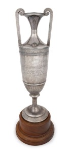 HORSERACING TROPHY: sterling silver trophy (missing lid) for 1952 Corowa Cup won by 'Atomic Light', stamped 'Australian Silver' on base, mounted on Tasmanian blackwood plinth; weight (ex plinth) 1.35kg.