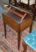 A Sheraton reading table, mahogany with ebony string inlay and bone escutcheon Finely crafted with tilting lid and original brass handles and castors,&nbsp;fitted accessory drawer to the right hand side, late 18th century. A rare and exceptional example. 74cm - 2