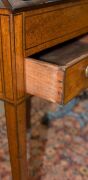 A Sheraton reading table, mahogany with ebony string inlay and bone escutcheon Finely crafted with tilting lid and original brass handles and castors,&nbsp;fitted accessory drawer to the right hand side, late 18th century. A rare and exceptional example. 74cm - 8