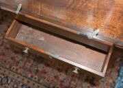 A Sheraton reading table, mahogany with ebony string inlay and bone escutcheon Finely crafted with tilting lid and original brass handles and castors,&nbsp;fitted accessory drawer to the right hand side, late 18th century. A rare and exceptional example. 74cm - 9