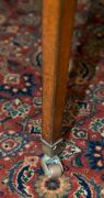 A Sheraton reading table, mahogany with ebony string inlay and bone escutcheon Finely crafted with tilting lid and original brass handles and castors, fitted accessory drawer to the right hand side, late 18th century. A rare and exceptional example. 74cm - 13