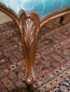 An antique English boudoir stool, carved walnut with blue velvet diamond upholstery, cabriole legs with scroll feet and original brass castors, mid 19th century, 49cm high, 80cm wide, 50cm deep - 3