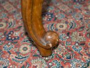 An antique English boudoir stool, carved walnut with blue velvet diamond upholstery, cabriole legs with scroll feet and original brass castors, mid 19th century, 49cm high, 80cm wide, 50cm deep - 6