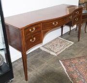 A George III Hepplewhite mahogany sideboard with string inlay and cross banding, finely crafted serpentine front with square form tapering legs, double fronted cellarette drawer to the left hand side, original brass drop handles with attractive reed decor - 2