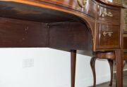 A George III Hepplewhite mahogany sideboard with string inlay and cross banding, finely crafted serpentine front with square form tapering legs, double fronted cellarette drawer to the left hand side, original brass drop handles with attractive reed decor - 15