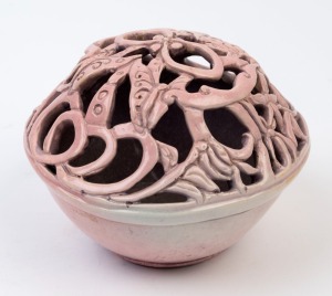 PAT PHILLIPS unusual pink glazed pottery bowl with pierced top, incised "Pat Phillips", 13cm high, 16cm wide