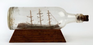 A folk art ship in bottle ornament, ​​​​​​​27.5cm wide