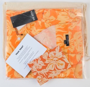 SCOTT MORRISON "MAHALO SCOMO" Hawaiian shirt designed by Mr. Koyo, featuring the Prime Minister's face as a repeating motif, referencing the Prime Minister's now infamous decision to go to Hawaii for a holiday during Australia's worst ever bushfire crisis in 2019. The shirt was released as part of fundraising efforts to support the N.S.W. Rural Fire Service. More than 1000 shirts were sold raising $35,891 for the R.F.S.