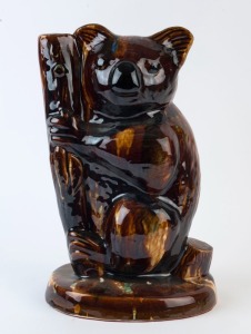 HUNTLY POTTERY koala statue with Rockingham style glaze, 39cm high