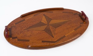 A vintage oval serving tray made from Queensland timbers including silky oak, cedar and walnut, Queensland origin, circa 1930s, ​​​​​​​53cm across the handles