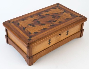 An inlaid timber box, Australian cedar, pine, silky oak, ebony and pollard oak, early 20th century, ​​​​​​​14cm high, 38.5cm wide, 24cm deep