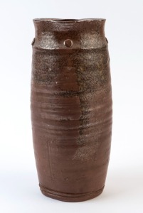 A studio pottery vase with incised character marks to base, 25cm high