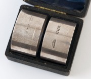 F.J. MOLE & Co. of Brisbane, pair of Australian silver napkin rings in original plush fitted box, early 20th century, stamped "STERLING SILVER" with "M", emu and cross, ​​​​​​​4.2cm diameter, 45 grams total - 2