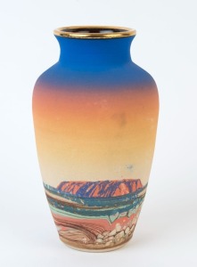 Australian pottery vase with desert landscape view of Uluru, incised signature (illegible), 18cm high