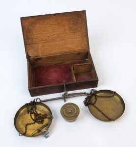 Antique gold scales in oak case with an attractive set of cup weights, 19th century, the box 21cm wide. PROVENANCE: Private Collection Bendigo
