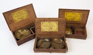 T.W. AVERY, three sets of antique gold scales in oak cases with original yellow manufacturer's label inside the lids, 19th century, the largest 19cm wide. PROVENANCE: Private Collection Bendigo