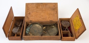 Three antique gold scales in timber cases, 19th century, the largest 22.5cm wide. PROVENANCE: Private Collection Bendigo