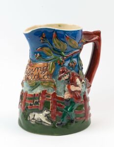 DIANA POTTERY "Waltzing Matilda" musical pottery jug, 20cm high