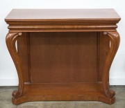 An early Australian Colonial cedar console table (Loudon's Encyclopaedia, 1833), circa 1835, top replaced, has been restored in the late 20th century, 89cm high, 106cm wide, 50cm deep Note: The matching pair is illustrated in "Australian Furniture Pictor