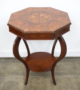 An exhibition top occasional table, circa 1870, with later blackwood base, inscribed "Created By Fred Moore, 1870 (Max Moore's Grandfather)" 75cm high, 73cm wide