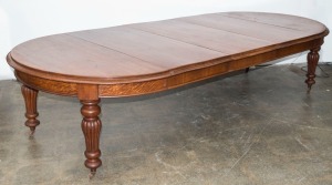 A fine Colonial Australian cedar three leaf extension D-end dining table, 19th century, 74cm high, 137cm (extends to 314cm) wide, 137cm deep