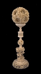 An impressive antique Chinese puzzle ball, 19th/20th century, 36cm high overall