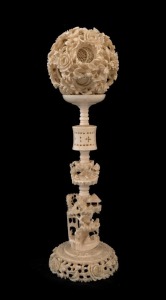 An antique Chinese puzzle ball, 19th/20th century, 29cm high overall
