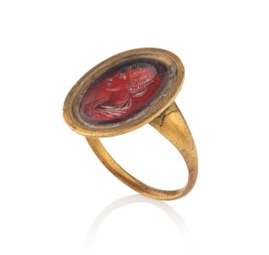 A Georgian intaglio carnelian yellow gold signet ring, early 19th century