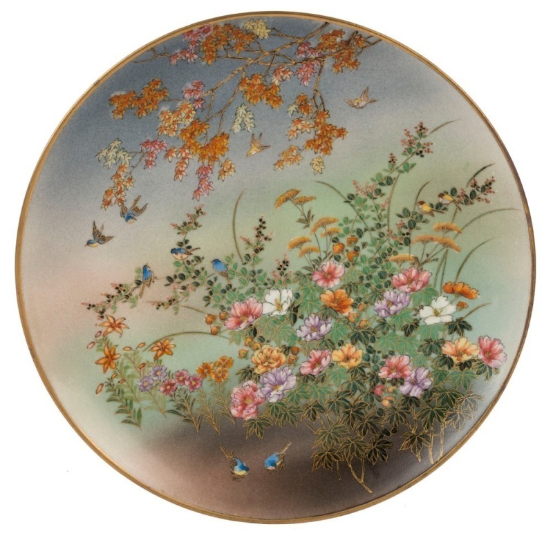 SATSUMA Japanese pottery plaque with autumn leaves, floral sprays and bluebirds, Meiji Period, 19th/20th century, ​​​​​​​24cm diameter