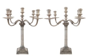 An impressive pair of English sterling silver five branch candelabra by William Gibson and John Langman of London, circa 1896, ​​​​​​​43cm high, weighted bases.
