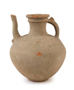 A Byzantine terracotta water jug. Intact with minor chipping evident. Palestine, Holyland, circa 7th to 9th century A.D.  29cm high