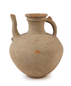 A Byzantine terracotta water jug. Intact with minor chipping evident. Palestine, Holyland, circa 7th to 9th century A.D. 29cm high