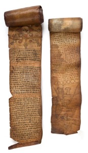 A Pair of Ethiopian protective scrolls. Vegetable dyes and ink on vellum. Classical Ethiopic language (Ge'ez), comprises a prayer designed to protect a young man against evil spirits which are causing suffering. The scroll would have been composed by a priest of the Ethiopian Orthodox church. It would have been carried by the owner or placed in his house to provide constant protection. The Ethiopian protective scroll tradition incorporates both Christian and pre-Christian elements. Much of the r