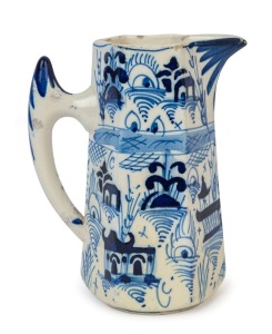 An antique tin glazed earthenware blue and white jug of tapering hexagonal form, 17th/18th century, 20cm high
