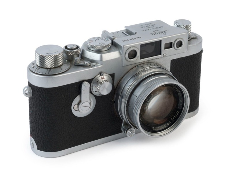 LEITZ: Leica 111g 35mm rangefinder camera [#828793], 1956, with Summicron 50mm, f2 screw-mount collapsible lens [#1266849] in maker's ERC with Leica Guide and Agfalux flash.