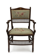 An antique English parlour chair, mahogany with marquetry inlay and green floral upholstery, late 19th century, 58cm across the arms