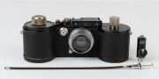 LEITZ: Leica 250 Reporter (GG) 35mm Rangefinder camera [#150164 series], 1943, with Summar f2 50mm lens [#335133], with both film magazines and shutter speed to 1000. - 2