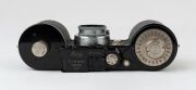 LEITZ: Leica 250 Reporter (GG) 35mm Rangefinder camera [#150164 series], 1943, with Summar f2 50mm lens [#335133], with both film magazines and shutter speed to 1000. - 5
