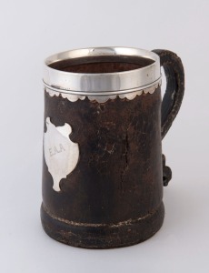 A vintage leather pint tankard with sterling silver mounts by Gorham Manufacturing Co. of Birmingham, 20th century, stamped "G.M. Co. Sterling Silver", 16cm high, 18cm wide
