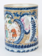 A Chinese export blue and white porcelain tankard with enamel vignettes of domestic scenes and gilt finished highlights, 18th century, 12cm high, 14cm wide - 4