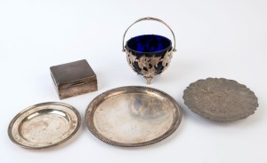 A sterling silver cigarette box, an Indian silver dish with engraved motif, a silver plated bonbon dish with blue glass liner and two silver plated dishes, 19th and 20th century, (5 items), the box 9cm wide