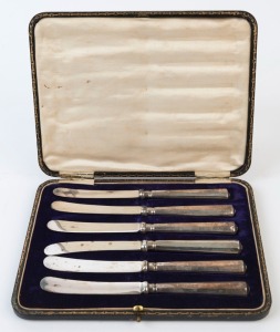 Boxed set of six silver handled fruit knives, early 20th century, the box 21cm wide