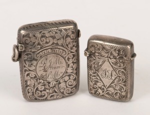 VESTA CASES: Two antique English sterling silver examples, the large hallmarked "W.N." for William Neale, Chester 1894; the smaller hallmarked for William Henry Leather, Birmingham, 1897; the larger 5cm high, 4cm wide.