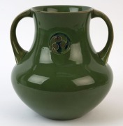 MOORCROFT "Flamminian" ware green glazed pottery vase with foliate&nbsp;roundel and two handles, circa 1905-1915, impressed mark "Moorcroft, Burslem" with green underglaze signature "W. Moorcroft", 20.5cm high - 2