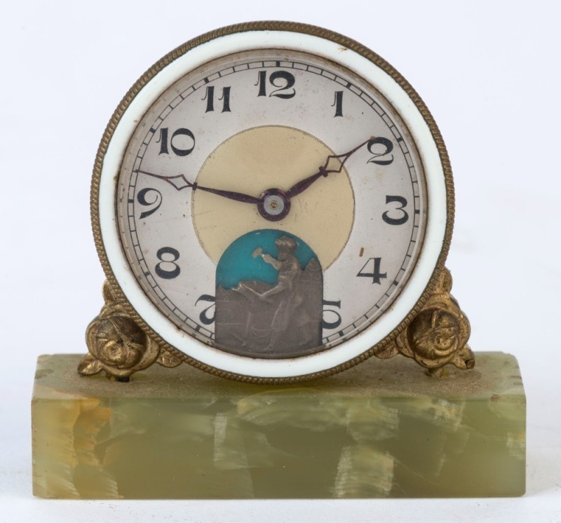 A Continental miniature clock on a green onyx base, circa 1920, ​​​​​​​6.5cm high